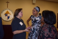 Chesapeake Employer's Insurance Company, Carolyn Gutermuth with Chief Development Officer of Catholic Charities Rita Wilson and a fellow CPI colleague