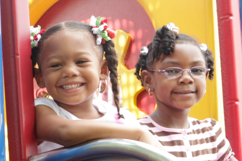 Two children play at Catholic Charities of Baltimore Head Start