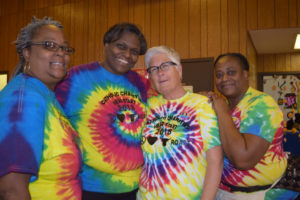 L-R: Family Services Coordinators Charlene Thomas, Vernell Walker and Tonia Bell, with Mary Gunning (3rd from left), Director of Catholic Charities Head Start of Baltimore City