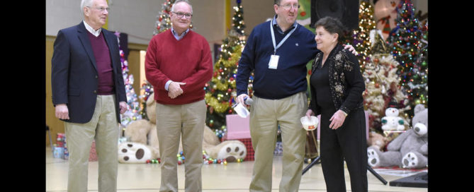 Christmas was full of joy at St. Vincent's Villa, our residential treatment Cntr for children, thanks to volunteers like Geri and Bob Olsen. At a Christmas sing-along Exec. Dir. Bill McCarthy along with St. Vincent's Villa Administrator Ezra Buchdahl honored the Olsens.